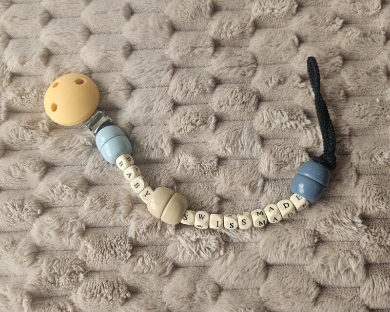 Attache lolette "baby swissmade"
