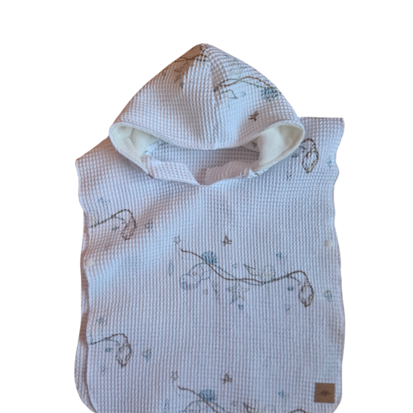 Poncho de plage de la mer